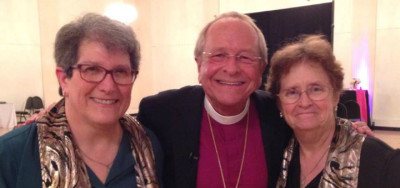 Bishop Robinson celebrating with Sue and Berdell Moffett-Chaney at Melody Ballroom