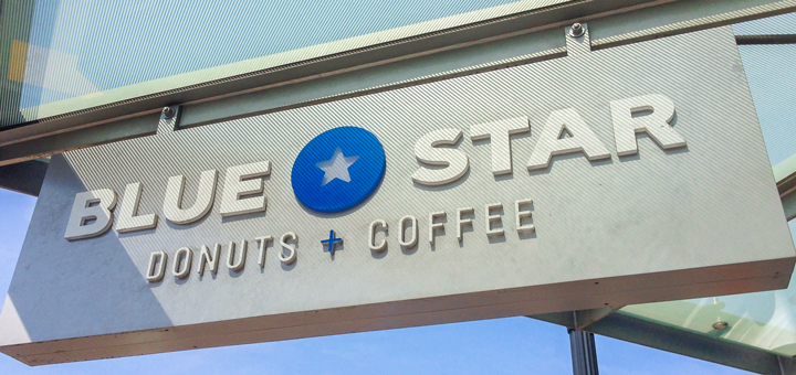 The Blue Star Donuts sign at the SW 13th and Washington location