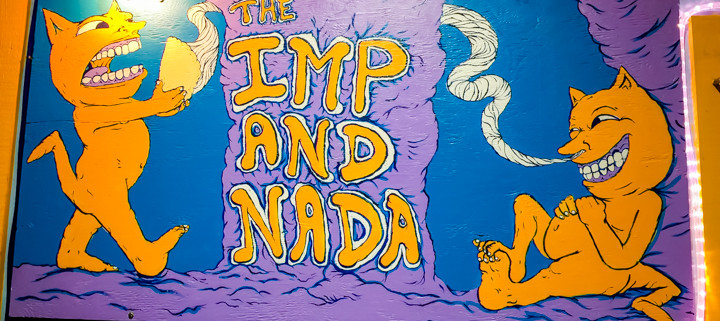 The Imp and Nada sign as seen on the food cart