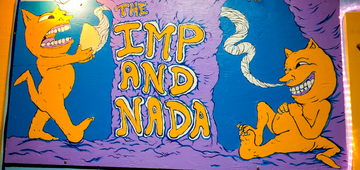 The Imp and Nada sign as seen on the food cart